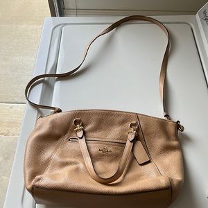 Leather camel colored coach bag with gold accents